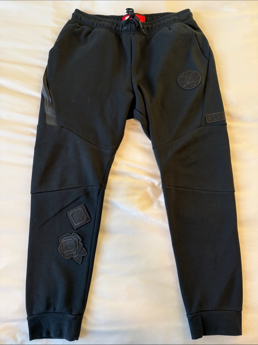 Nike Black Sweatpants with Red Logo Patch